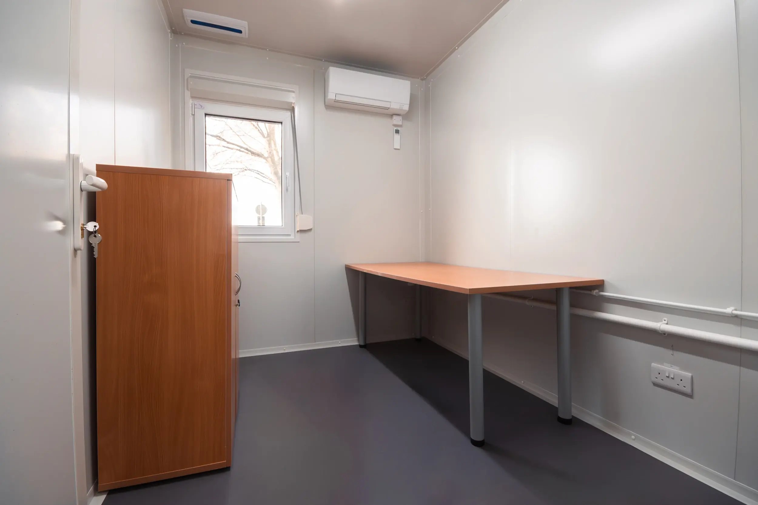 tf-jackson-used-buildings-find-space-portable-building-interior-with-desk-and-furniture